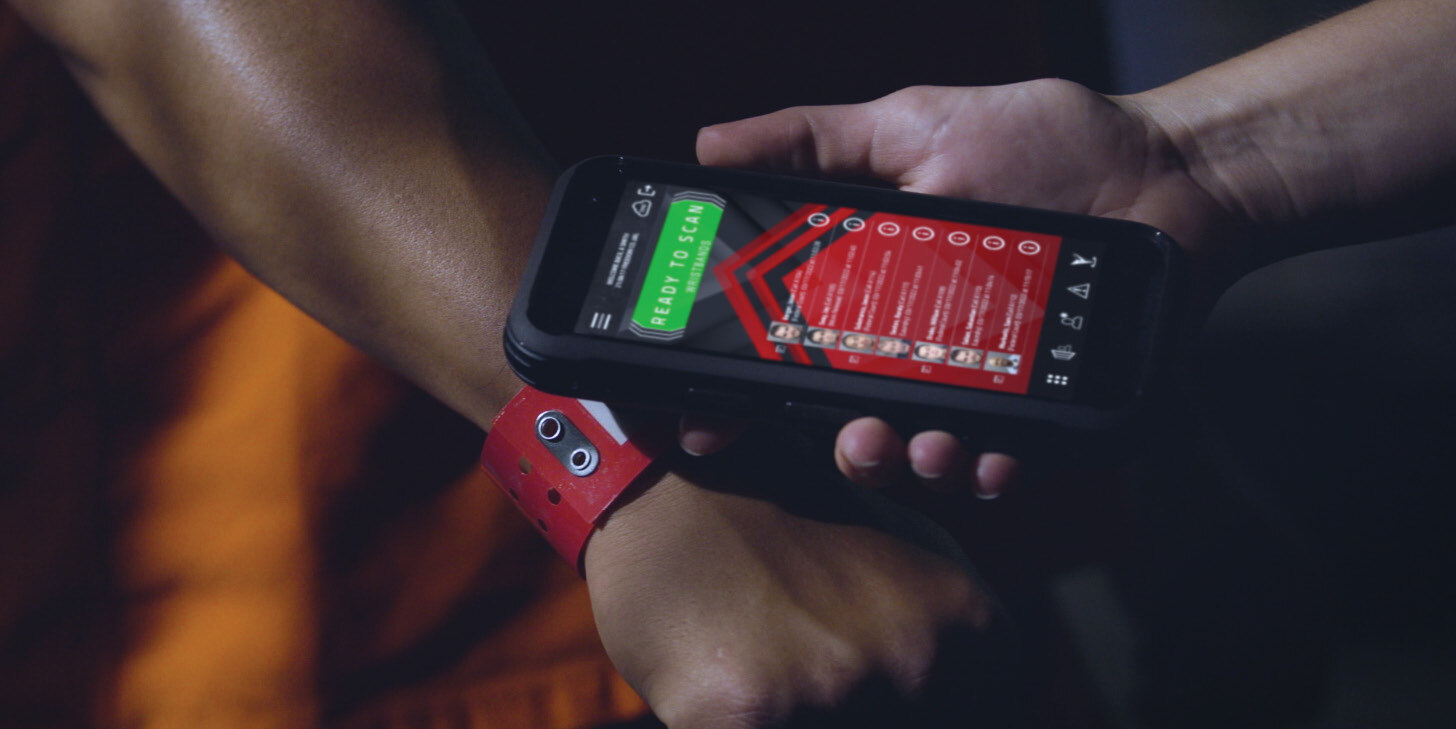 OXP - Command Cloud - officer scanning RFID wristband